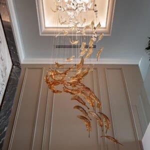Aurelia cascade chandelier luxury LED chandelier India cascading chandelier for staircase and foyer lighting modern vertical chandelier with brushed gold finish designer LED chandelier for double height living room luxury chandelier for entrance hall and lobby contemporary chandelier with warm ambient lighting premium chandelier for modern interiors India elegant cascading light fixture for staircase void brushed gold chandelier for luxury home interiors modern suspension chandelier for dining area