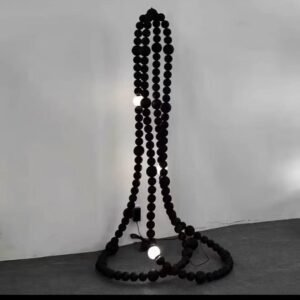 Noir bead column floor lamp sculptural floor lamp India designer floor lamp with bead structure lighting modern black floor lamp for living room India artistic floor lamp for gallery and studio interiors ambient lighting floor lamp with textured design contemporary sculptural floor lamp matte black finish decorative floor lamp for luxury interiors India premium floor lamp for hospitality and lounge spaces unique designer floor lamp for modern home décor statement floor lamp with bead column structure